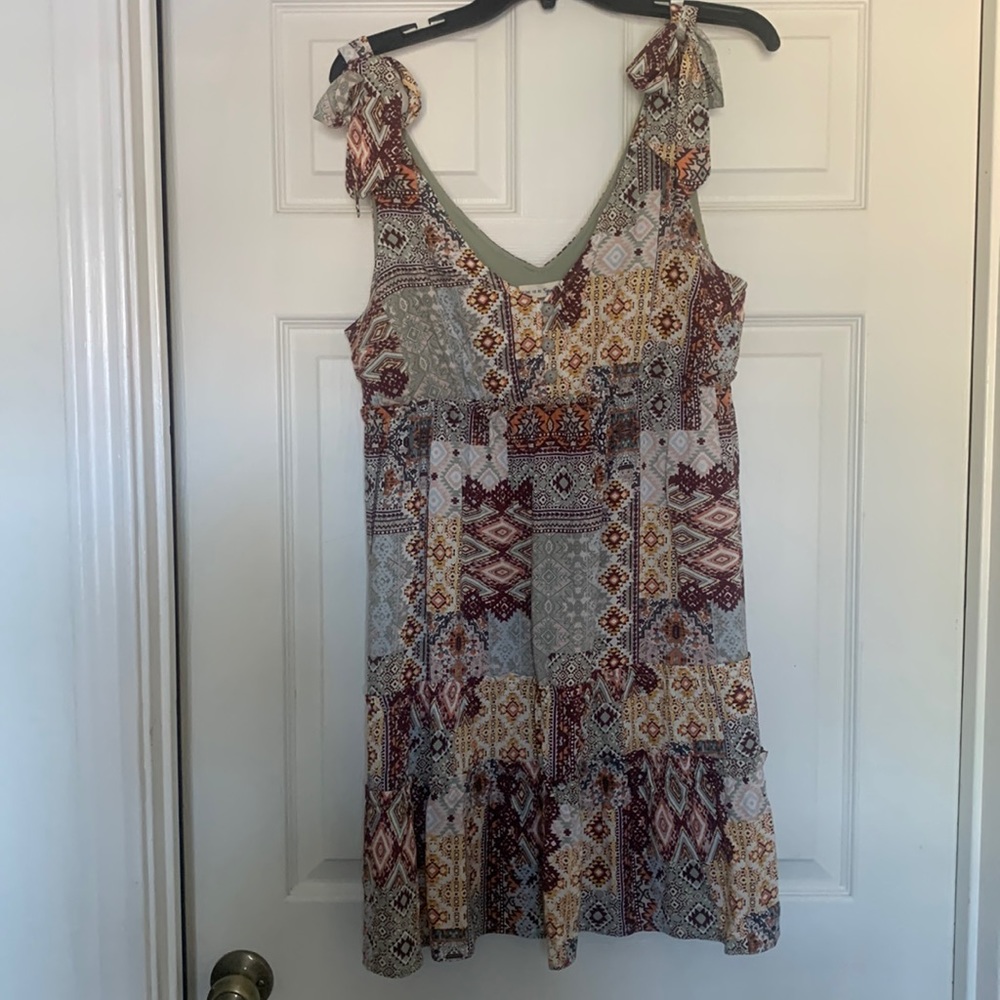 Sundress with shoulder ties and ruffle tiered hem